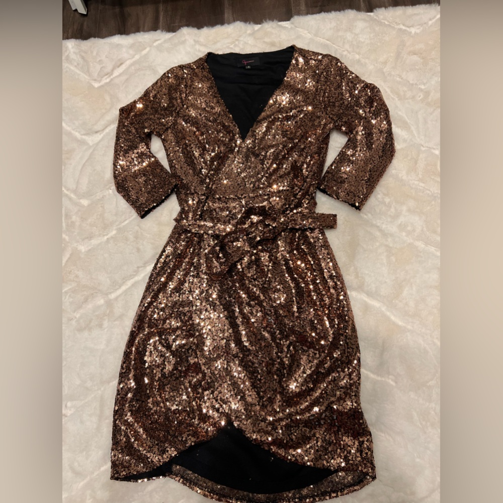 Rose gold sequins dress by aqua dresses with tie wrap in size small.
